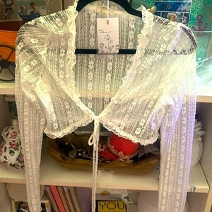 Brand New Long Lace shirt that ties i the front